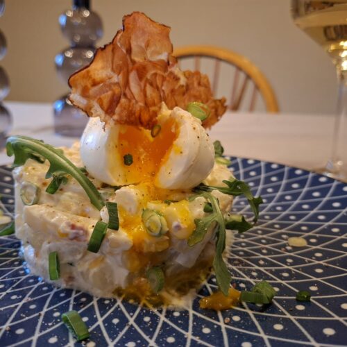 aspergetartaar met serranoham en een gepocheerd eitje